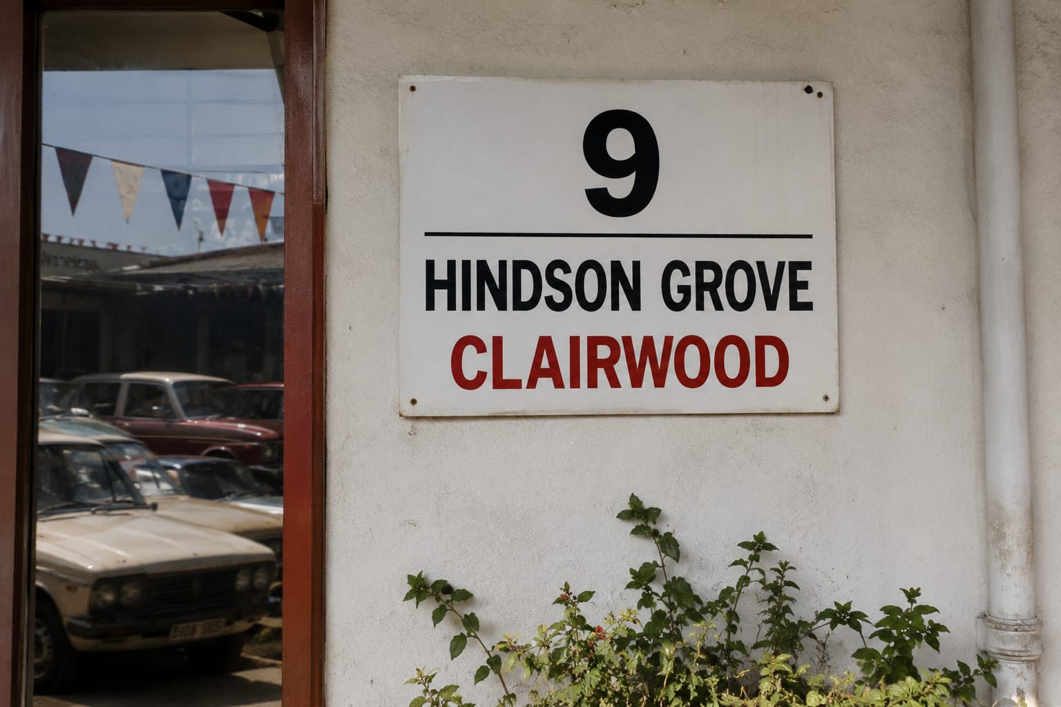 Enamel street sign reading 9 Hindson Grove, Clairwood
